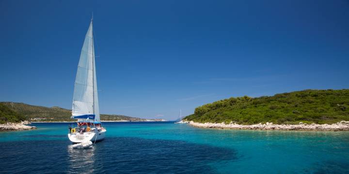 Sailing boat in the blue waters in Lefkas, Greece