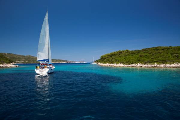 Sailing boat in the blue waters in Lefkas, Greece